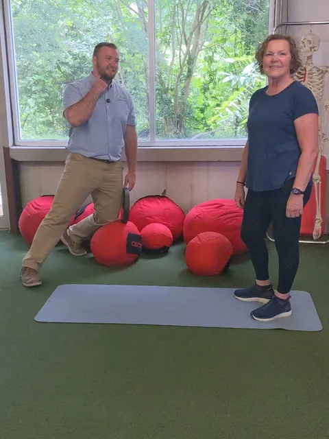 A strength and conditioning coaching session at Cross Chiropractic